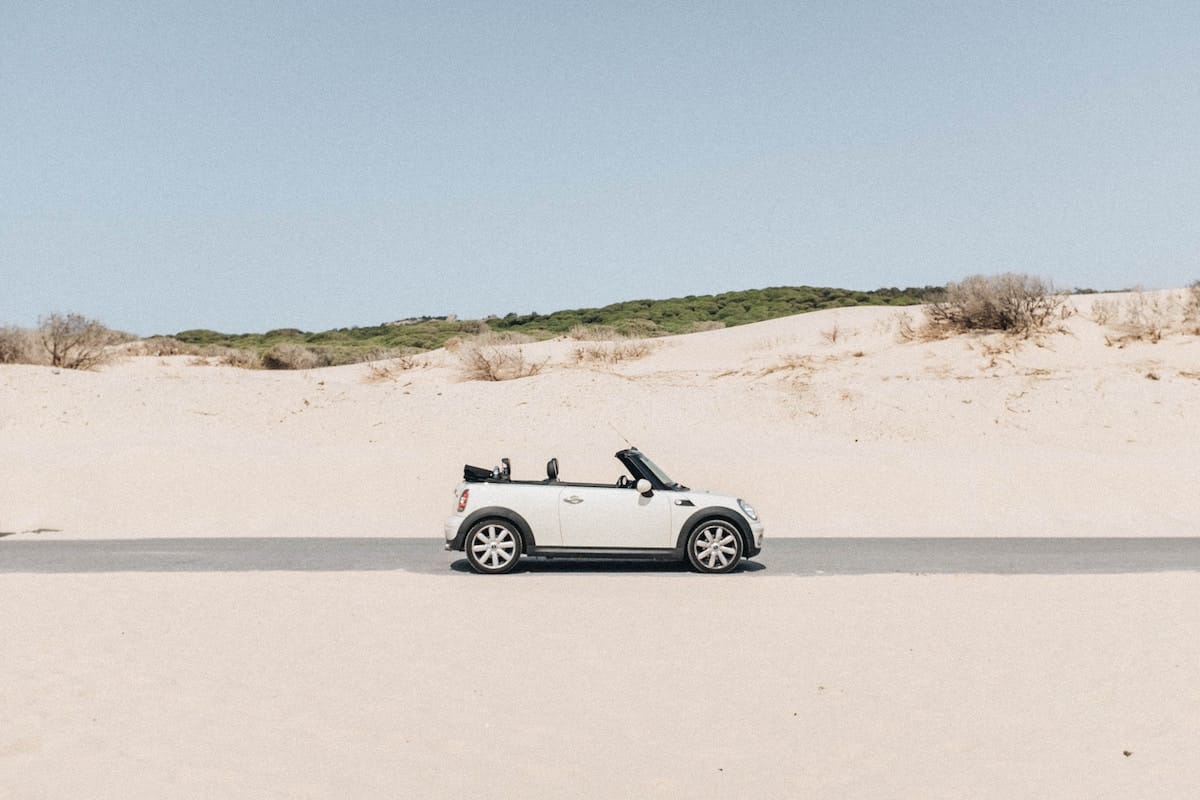 mini cooper in sand dunes