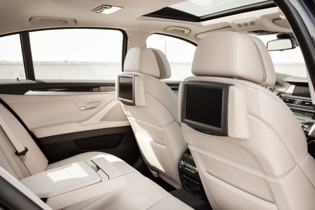 interior of audi suv with television head seats