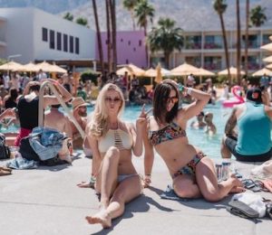 two girls at the saguaro pool in Palm Springs
